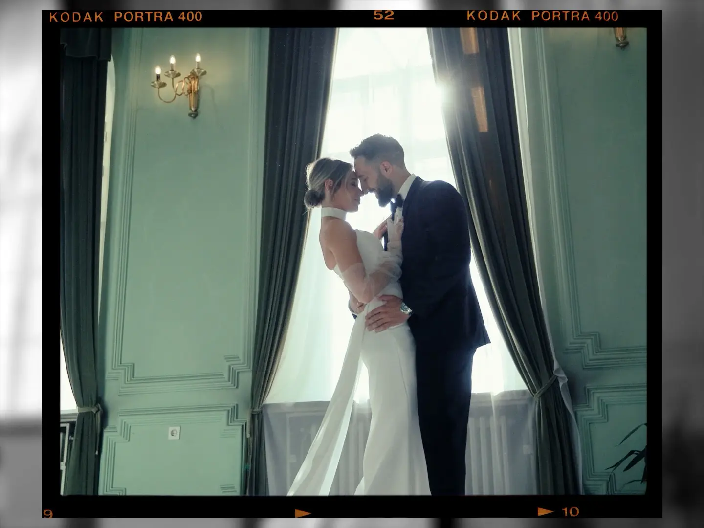 A couple kissing in the window light, Cetinje