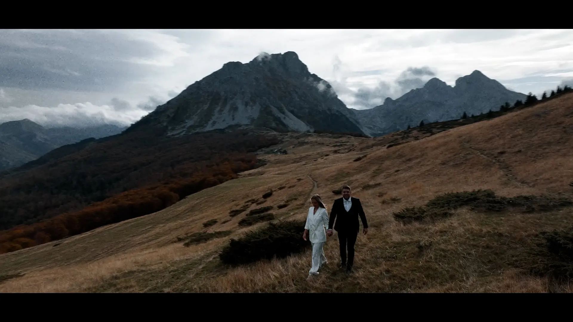 A couple running toward the camera, Montenegro